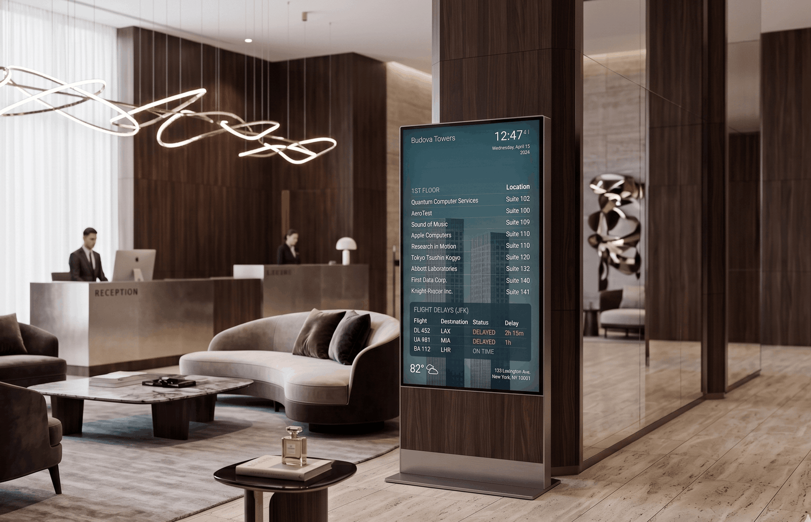 Free-standing DAKboard directory display in a hotel lobby listing businesses, suites, and a flight schedule