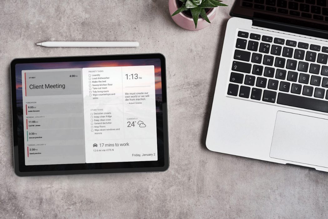 Full-color display design Tablet running DAKboard displays a full-color agenda, priority task checklist, weather, and commute time layered over a sunset photo